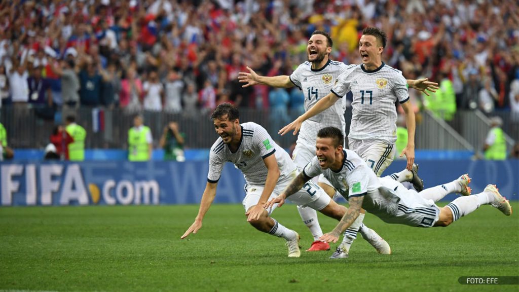 Sergei Ignashevich lava su error y celebra el pase de Rusia a cuartos